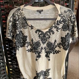 Paper thin Express tee.